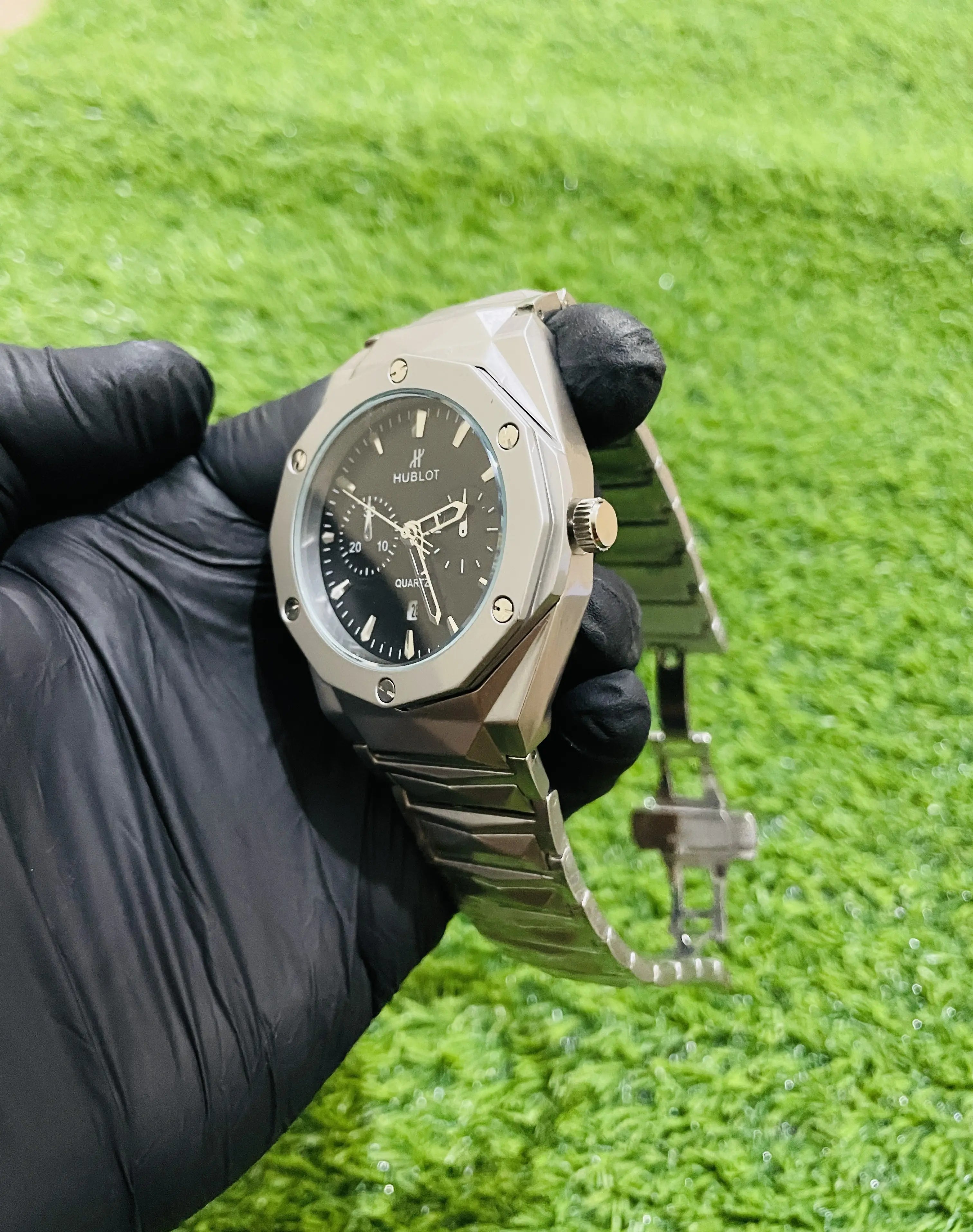 “Hublot diamond-cut stainless steel luxury watch