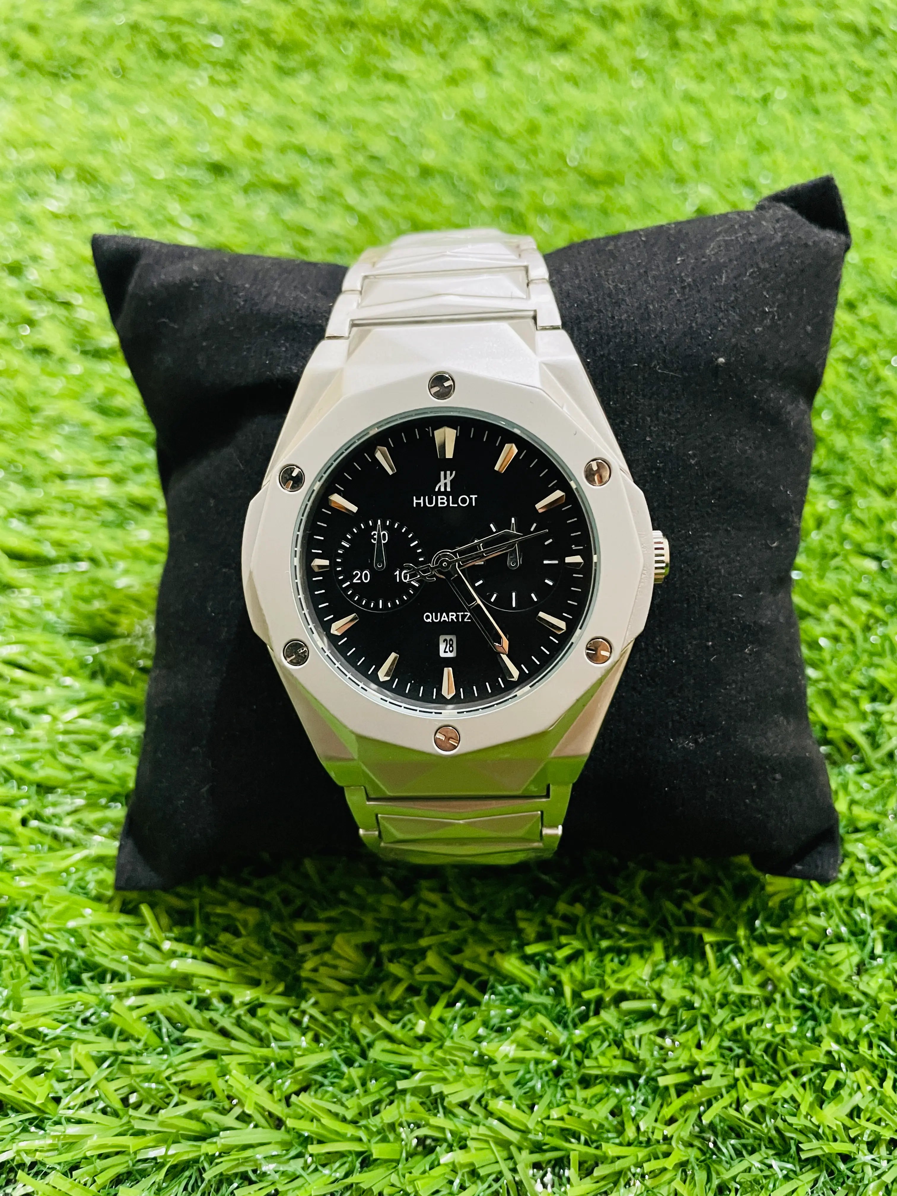 “Hublot diamond-cut stainless steel luxury watch