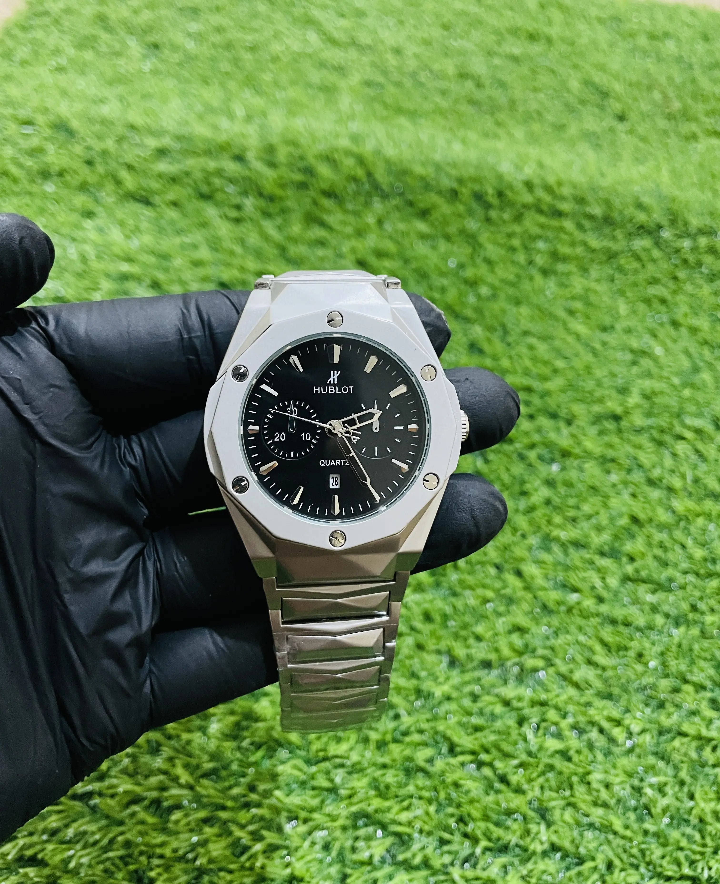 “Hublot diamond-cut stainless steel luxury watch