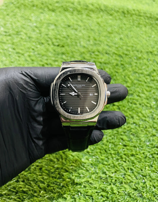 Patek Philippe men’s leather strap watch