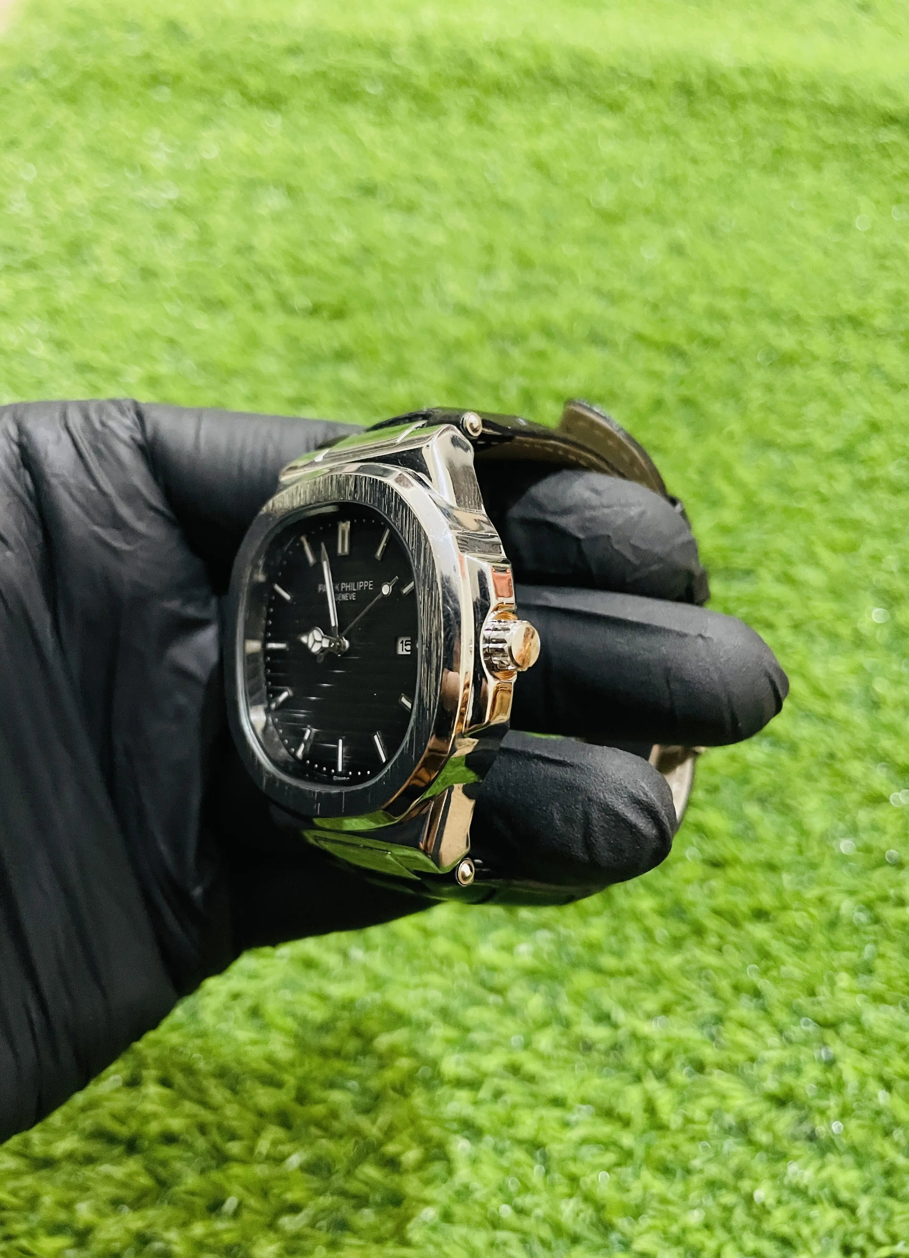 Patek Philippe men’s leather strap watch