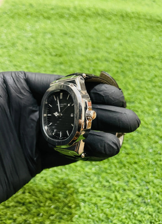 Patek Philippe men’s leather strap watch